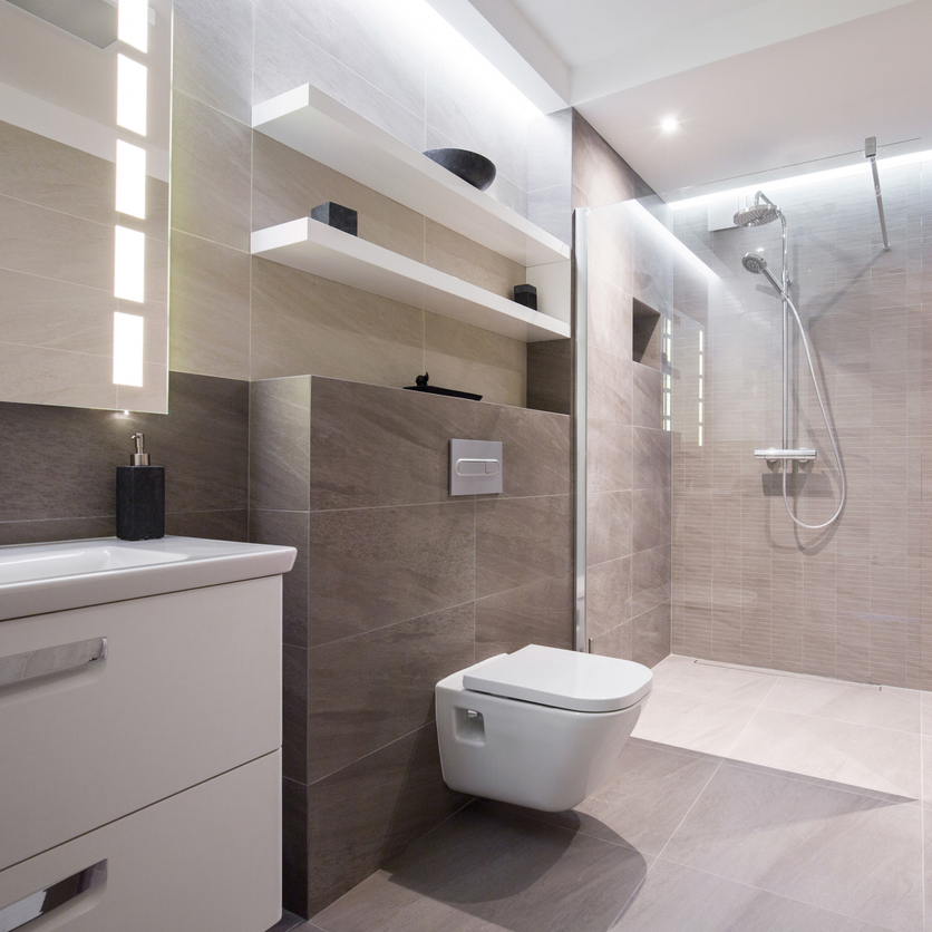 Exclusive modern white bathroom with glass shower